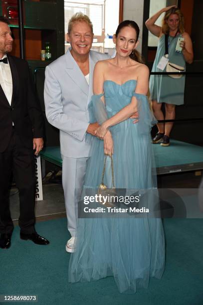 Uwe Fahrenkrog-Petersen and his partner Christin Dechant attend the Green Awards 2023 at Urban Tech Republic am Flughafen Tegel on June 14, 2023 in...