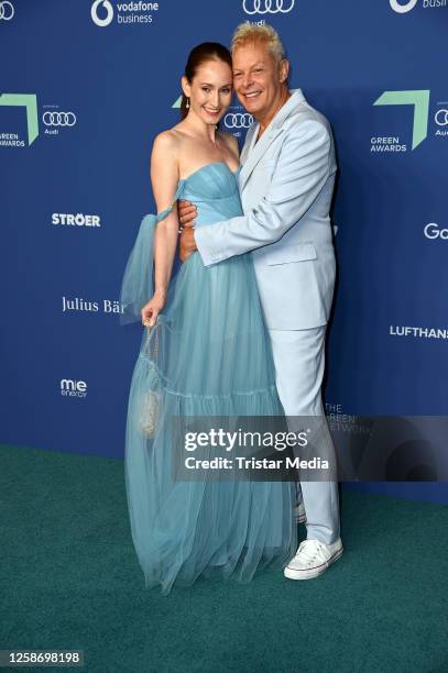 Uwe Fahrenkrog-Petersen and his partner Christin Dechant attend the Green Awards 2023 at Urban Tech Republic am Flughafen Tegel on June 14, 2023 in...