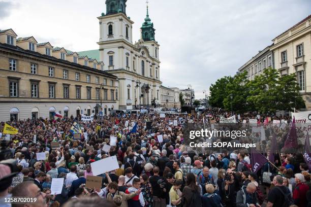 Protesters seen gathering during the demonstration. Under the slogan "Not One More!" , thousands of Poles took to the streets in Warsaw and in...