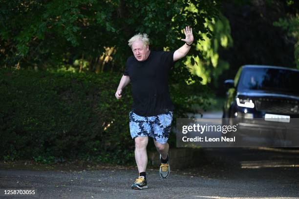 Former British Prime Minister Boris Johnson is seen on his morning run on June 15, 2023 in Brightwell-cum-Sotwell, England. The Privileges Committee...