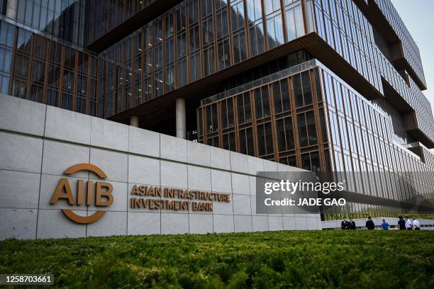 The logo of the Asian Infrastructure Investment Bank is seen at its headquarters in Beijing on June 15, 2023.