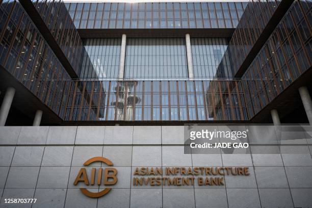 The logo of the Asian Infrastructure Investment Bank is seen at its headquarters in Beijing on June 15, 2023.
