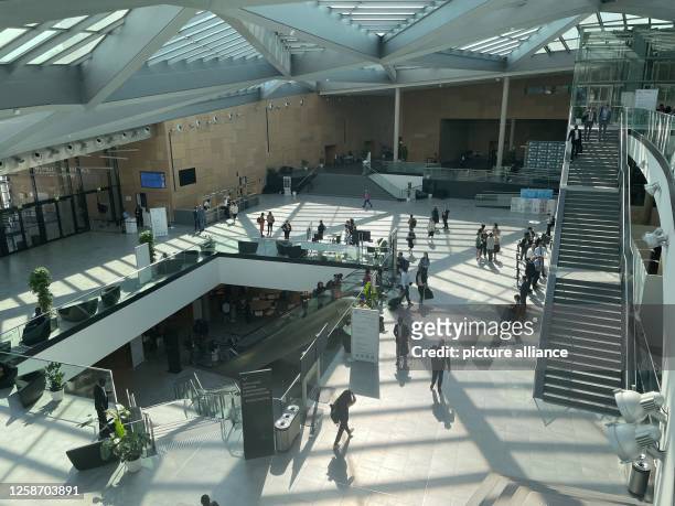 June 2023, North Rhine-Westphalia, Bonn: Delegates are on their way to their meetings at the World Conference Center in Bonn on the last day of the...