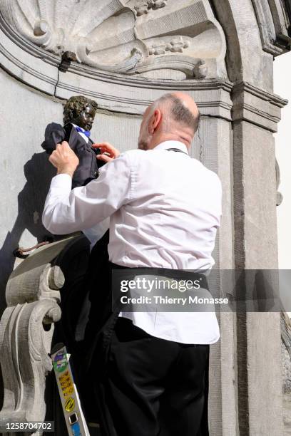 The Manneken Pis dressed as Charles Rogier is undressed on June 14, 2023 in Brussels, Belgium. Charles Rogier is a Belgian statesman of liberal...