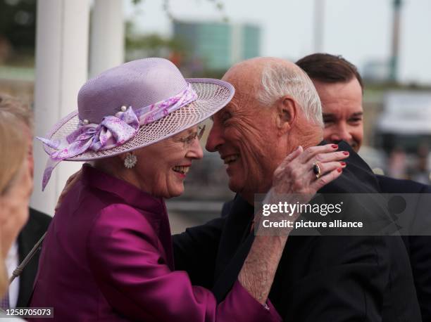 June 2023, Denmark, Kopenhagen: Norway's King Harald V is greeted by Denmark's Queen Margrethe II at a boat dock in Copenhagen. The Norwegian royal...