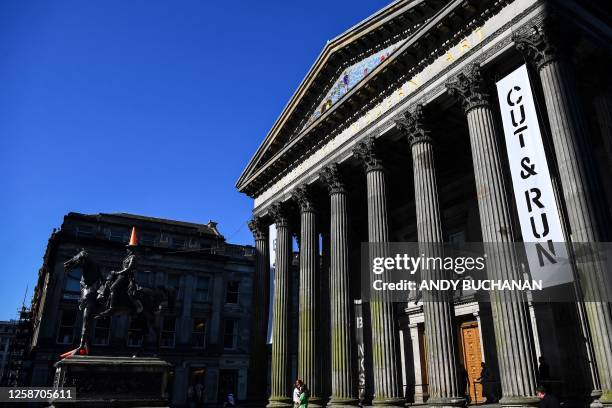 Photograph taken on June 15, 2023 shows the Wellington statue with a traffic cone on its head at the entrance of The Gallery Of Modern Art , in...