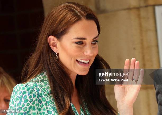Catherine, Princess of Wales reacts as she leaves Riversley Park Children's Centre on June 15, 2023 in Nuneaton, England.