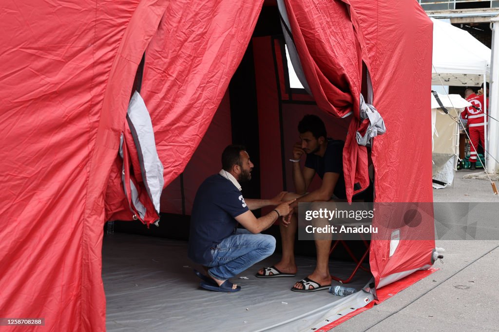 Rescued immigrants in Greece's Kalamata