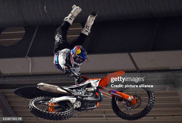 June 2023, Thuringia, Erfurt: Luc Ackermann, freestyle motocross world champion from Thuringia, shows off his skills at a press demonstration at...