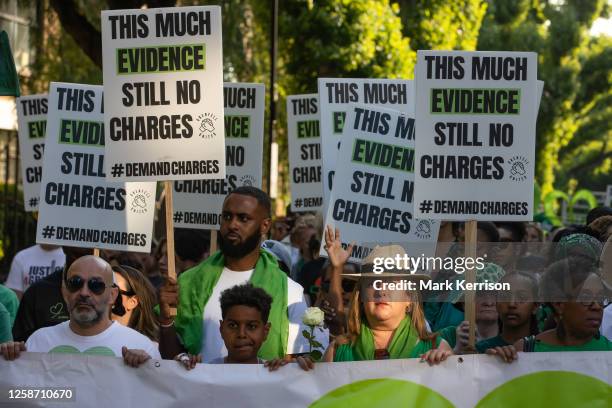 Members of the Grenfell community and supporters take part in the Grenfell Silent Walk around West Kensington on 14 June 2023 in London, United...