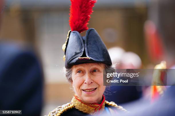 Princess Anne, the Princess Royal, speaks with guests after the presentation of the new Sovereign's Standard to The Blues and Royals during a...