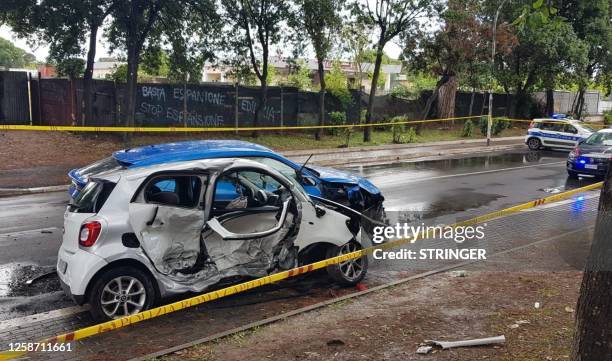 Photo taken on June 14, 2023 and obtained from Italian news agency Ansa shows the site of a car crash that involved a Lamborghini and a Smart in the...