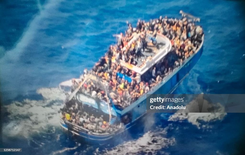 Rescued immigrants in Greece's Kalamata