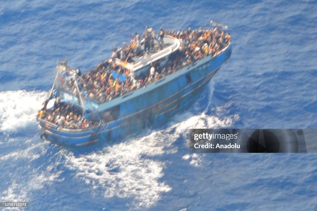 Rescued immigrants in Greece's Kalamata