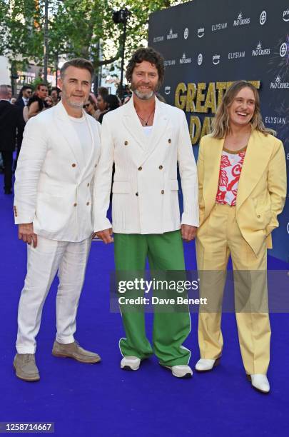 Gary Barlow, Howard Donald and Mark Owen of Take That attend the World Premiere of Take That's "Greatest Days" at the Odeon Luxe Leicester Square on...