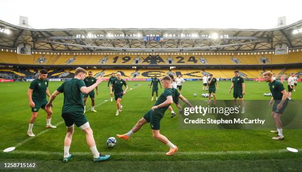 Athens , Greece - 15 June 2023; Evan Ferguson, centre, and teammate Nathan Collins, left, during a Republic of Ireland training session at the OPAP...