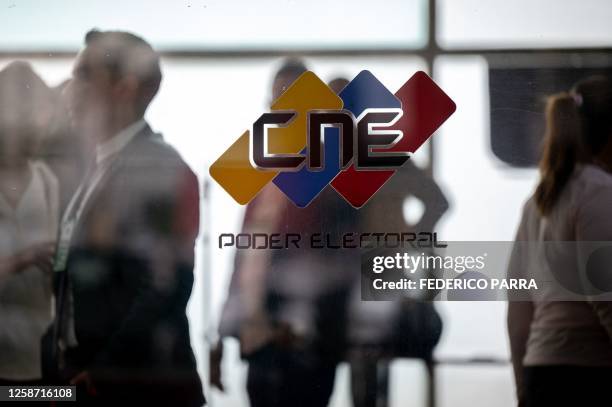 The logo of Venezuela's National Electoral Council is seen at its headquarters in Caracas on June 15, 2023. Part of the board of Venezuela's National...