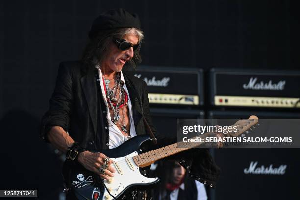 Guitarist Joe Perry performs with the band Hollywood Vampires during the Hellfest Summer Open Air rock festival in Clisson, western France, on June...