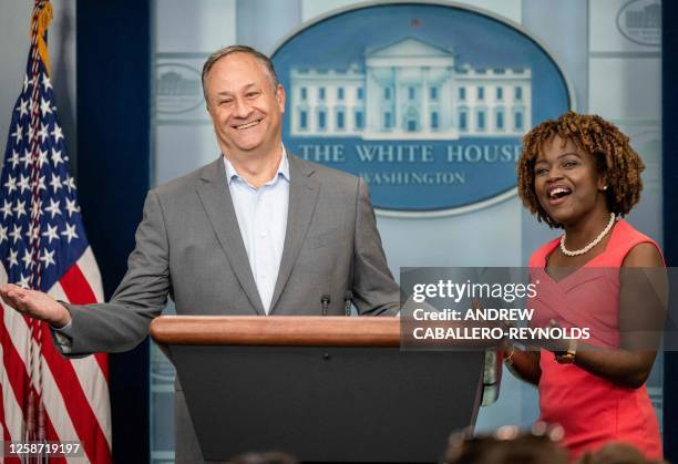 Second Gentleman Doug Emhoff gestures after telling a joke with White House Press Secretary Karine Jean-Pierre for a Fathers Day video that the White...