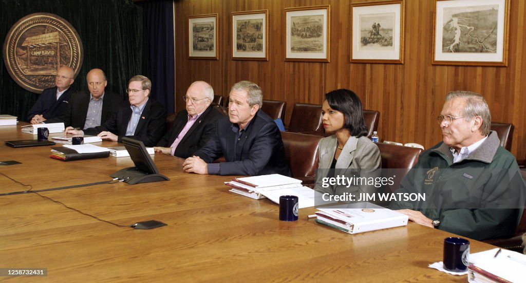 TOPSHOT-US-IRAQ-BUSH-CHENEY