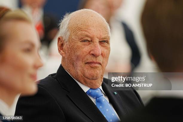 King Harald V of Norway attends a meeting with Norwegian students in Aarhus, on June 16 during an official visit of Norway's royal couple to Denmark....