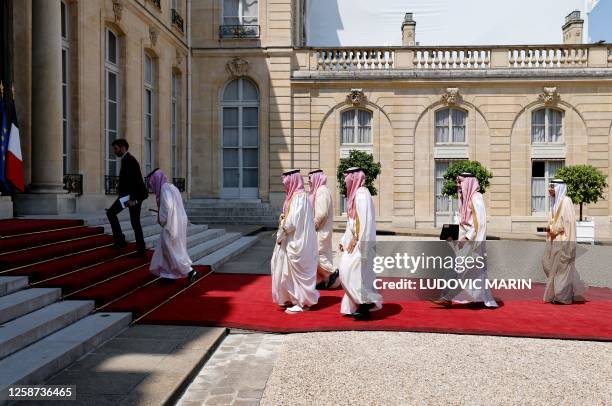 Saudi Crown Prince staff arrives at presidential Elysee Palace in Paris, on June 16, 2023 ahead of France's President and Saudi Crown Prince's...