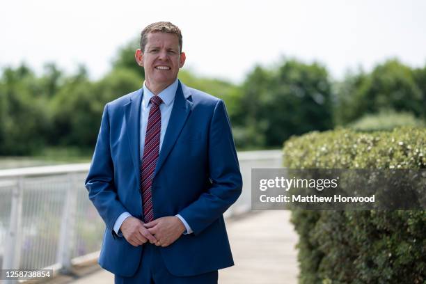 Rhun ap Iorwerth poses for a photograph after he is confirmed as Plaid Cymru's new leader at St. David's Hotel, Cardiff Bay on June 16, 2023 in...