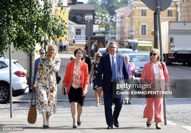 The Finns Party chair Riikka Purra , Christian Democrats chair Sari Essayah, National Coalition Party chair PM-designate Petteri Orpo and Swedish...