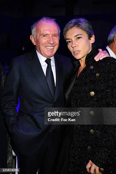 Businessman Francois Pinault and TV presenter Elisabeth Quin attend the Bal Jaune Fiac 2010 at the Pavillon Cambon Capucines on October 22, 2010 in...