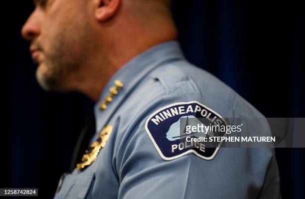 Minneapolis Police Chief Brian O'Hara listens as Attorney General Merrick B. Garland addresses the findings of a Justice Department investigation...