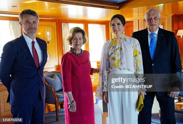 Crown Prince Frederik of Denmark, Queen Sonja of Norway, Crown Princess Mary of Denmark and King Harald V of Norway pose at The Royal Yacht Norge in...