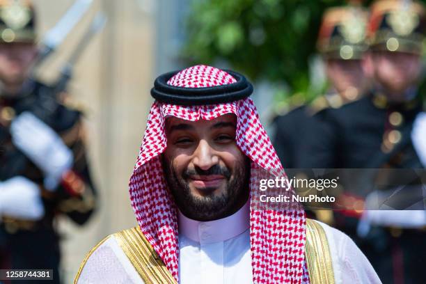 Mohammed ben Salmane Crown Prince and Prime Minister of Saudi Arabia arrives at the Elysee Palace to meet the French President Emmanuel Macron .