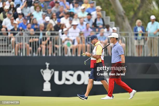 Billy Horschel walks with his caddie on the 14th green during the second round of the 123rd U.S. Open Championship at The Los Angeles Country Club on...