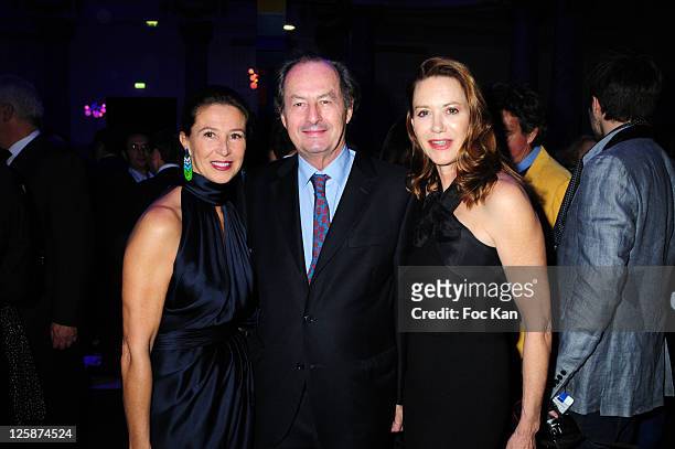 Corinne Ricard and writer Jean Marie Rouart and a guest attend the Bal Jaune Fiac 2010 at the Pavillon Cambon Capucines on October 22, 2010 in Paris,...