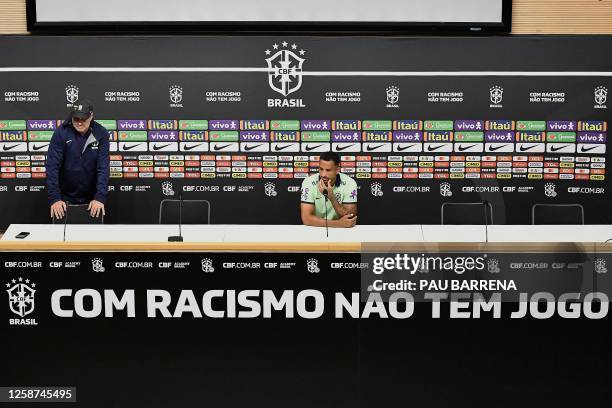 Brazil's defender Danilo addresses a press conference following a training session at the RCDE Stadium in Cornella de Llobregat on June 16 on the eve...