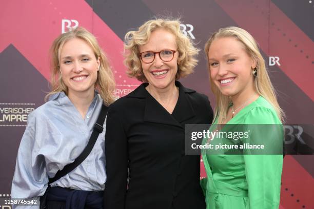 June 2023, Bavaria, Munich: Actress Juliane Köhler comes with her daughters Fanny and Jette to the Bavarian Film Award ceremony at the...