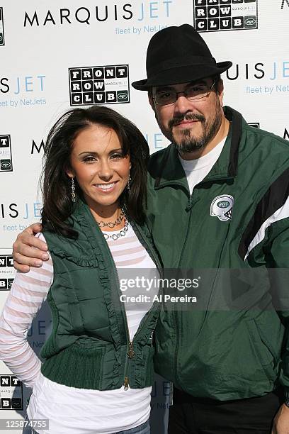 On-field Hostess Jenn Sterger of the New York Jets conducts an interview with Actor David Zayas at the St. Louis Rams vs New York Jets game at Giants...