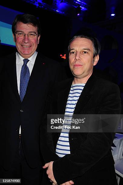 Minister Xavier Darcos and TV journalist Philippe Vandel attend the Bal Jaune Fiac 2010 at the Pavillon Cambon Capucines on October 22, 2010 in...