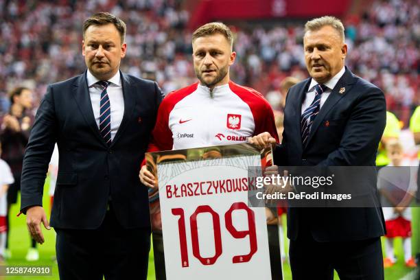 Jakub Blaszczykowski of Poland and Cezary Kulesza looks on prior to the international friendly match between Poland and Germany at Stadion Narodowy...