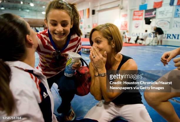 Mary Lou Retton and her daughter McKenna Kelley celebrate with Chellsie Memmel after she was announced as member of the 2008 Olympic team on the...