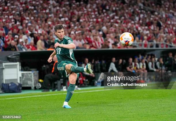 Paddy McNair of Northern Ireland controls the ball during the UEFA EURO 2024 qualifying round group H match between Denmark and Northern Ireland at...