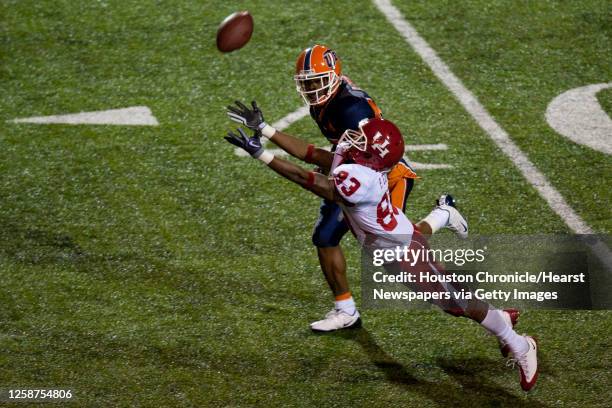 Houston wide receiver Patrick Edwards can't get his hands on a Case Keenum pass as UTEP cornerback Cornelius Brown defends during the second quarter...