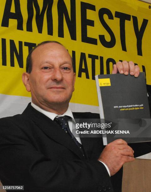 Mohamed Sektaoui, head of Amnesty International's Moroccan branch presents the international annual report in Rabat on June 8, 2010. Amnesty...