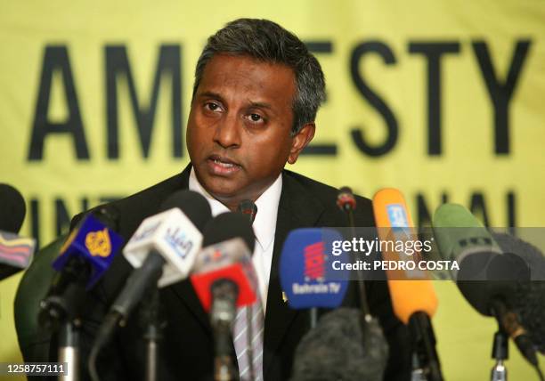 Amnesty International secretary general Salil Shetty speaks during a press conference at the journalists' syndicate in the Egyptian capital Cairo on...