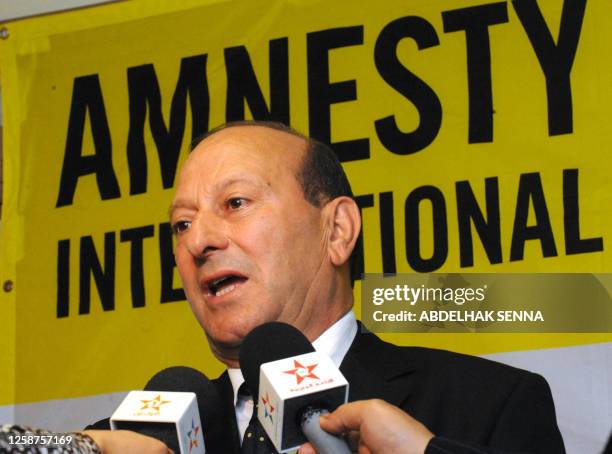 Mohamed Sektaoui, head of Amnesty International's Moroccan branch presents the international annual report in Rabat on June 8, 2010. Amnesty...