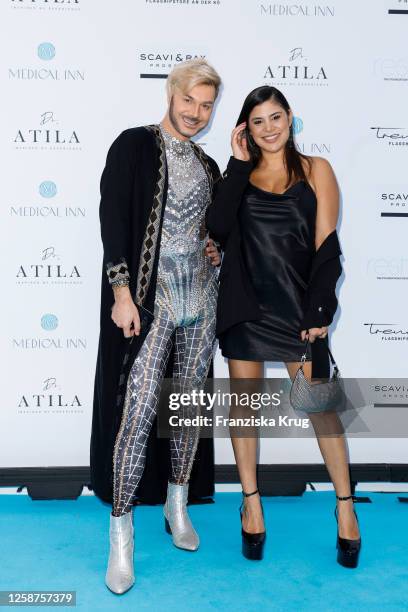 Sam Dylan and Tanja Tischewitsch attend the Medical Inn Grand Opening and Charity Event at Medical Inn on June 16, 2023 in Duesseldorf, Germany.