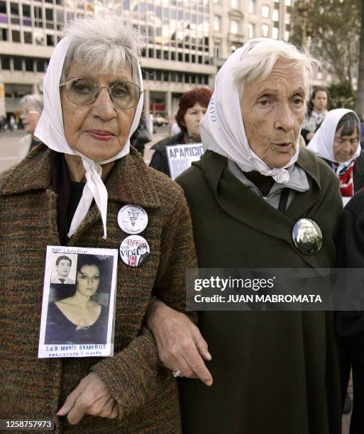Mirta Acuña de Baravalle and Josefina "Pepa" Garcia de Noia, both members of the Madres de Plaza de Mayo human rights organization, take part in the...