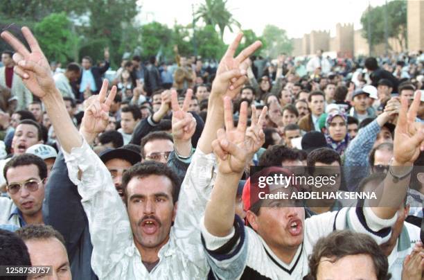 Unemployed Moroccan graduates chant slogans 26 April 1999 in downtown Rabat in a demonstration for "right to employment". Protesters chanted slogans...