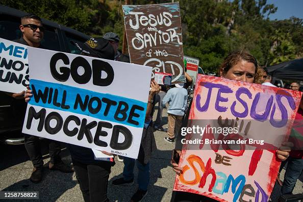Protestans Sign Christians hold signs as they gathered to pray and protest against ...