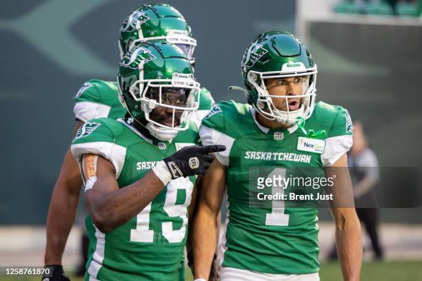 Samuel Emilus and Jake Wieneke of the Saskatchewan Roughriders celebrate after a touchdown in the game between the Winnipeg Blue Bombers and...